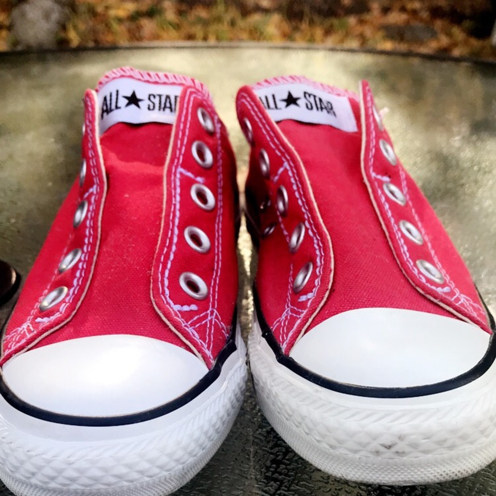 Red Converse Chuck Taylor All Stars.